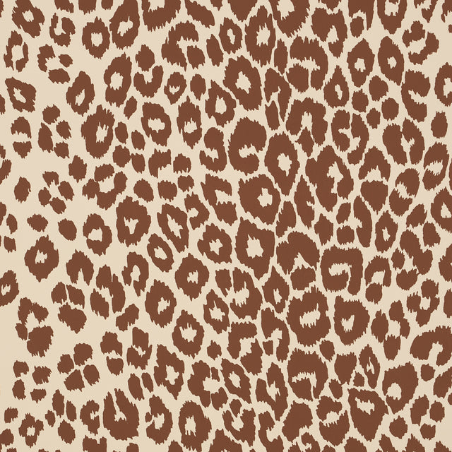 Iconic Leopard wallpaper in brown on neutral by Schumacher, featuring a bold animal print pattern.
