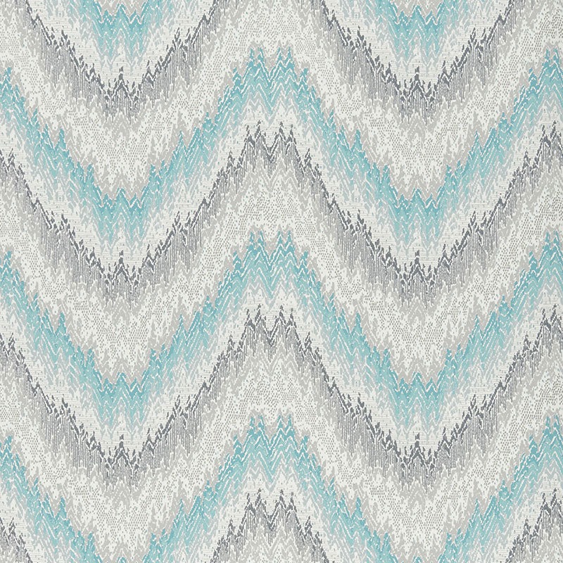 PETIT FEU wallpaper in Cyprus by Schumacher, featuring a chevron zigzag pattern in blue, grey, and white tones.