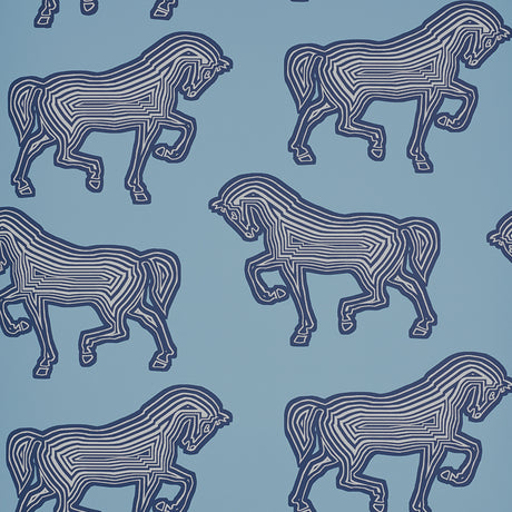 Blue wallpaper with a graphic equestrian horse pattern by Schumacher, FAUBOURG collection.