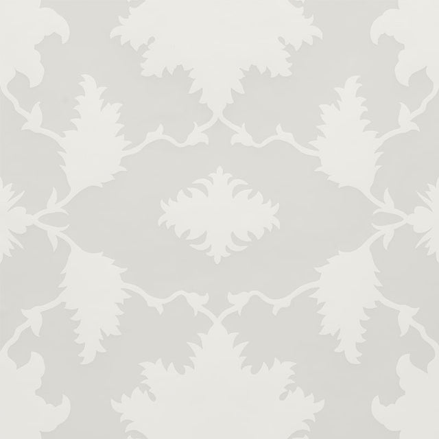 Garden of Persia Quartz wallpaper by Mary McDonald for Schumacher, large-scale Persian-inspired floral damask in white and soft grey, shown in a dining room setting.