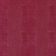 Komodo Lacquer Embossed Faux Lizard Wallpaper by Schumacher in a rich, luminous finish, shown in a styled interior and close-up detail.