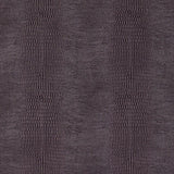 Komodo Sepia wallpaper by Schumacher features a luminous, embossed faux reptile pattern in a rich sepia tone.