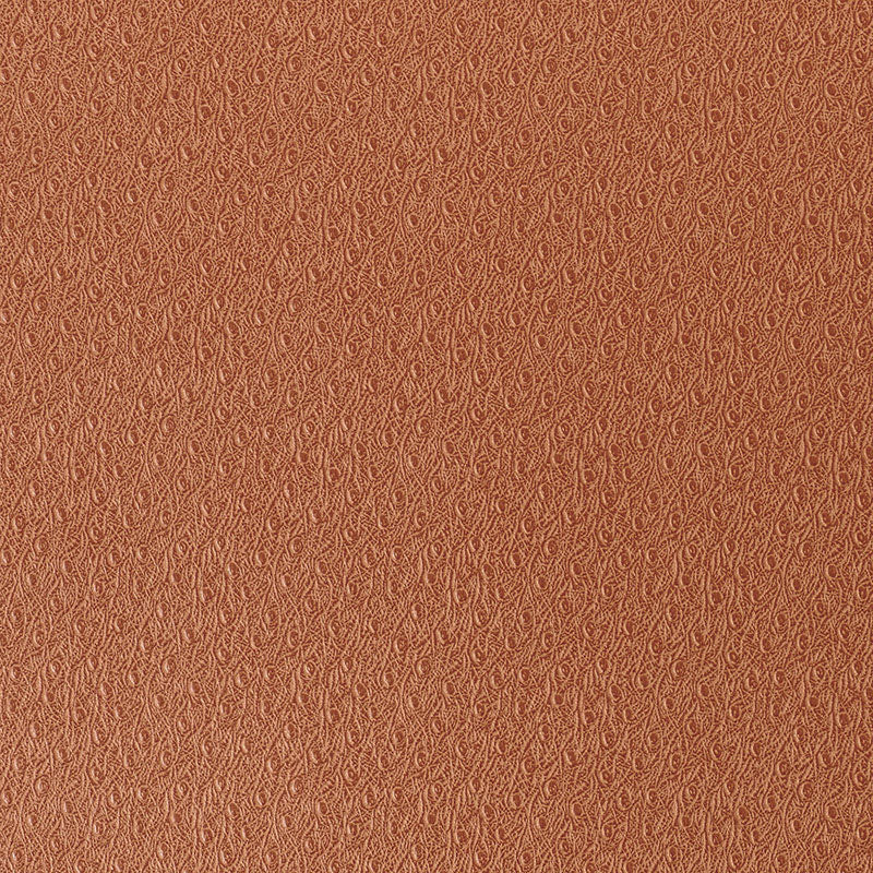 Embossed faux ostrich skin wallpaper in ginger color by Schumacher