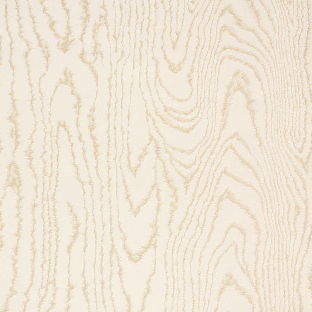 Faux Bois Sand Shimmer wallpaper by Schumacher shown in a stylized wood-grain pattern with a hint of iridescence, installed in a modern dining room.