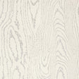 Faux Bois Silver Moon wallpaper by Schumacher shown in a modern dining room and as a close-up of the wood grain pattern.