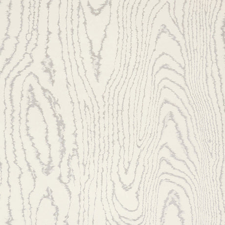 Faux Bois Silver Moon wallpaper by Schumacher shown in a modern dining room and as a close-up of the wood grain pattern.