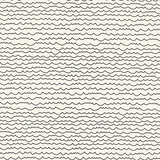 Waves wallpaper in black and white by Schumacher, featuring a graphic horizontal stripe pattern reminiscent of hand-drawn lines.