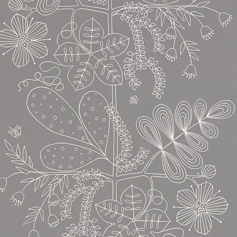 Blommen Smoke wallpaper by Schumacher featuring a whimsical white floral line drawing on a smoky grey background, shown in a modern bathroom interior.