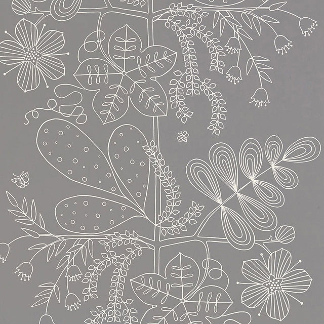Blommen Smoke wallpaper by Schumacher featuring a whimsical white floral line drawing on a smoky grey background, shown in a modern bathroom interior.