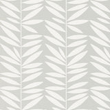 Leaf Stripe wallpaper in Mist by Schumacher, featuring a modern botanical leaf pattern in soft grey and white.