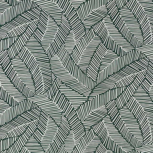 Abstract leaf patterned wallpaper in metallic slate, shown in a modern bathroom setting by Schumacher.