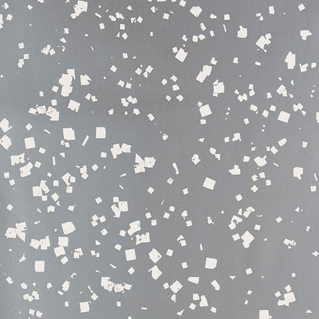 Snow wallpaper in Sterling by Schumacher, featuring a flurry of white dots and squares on a shimmering grey background.