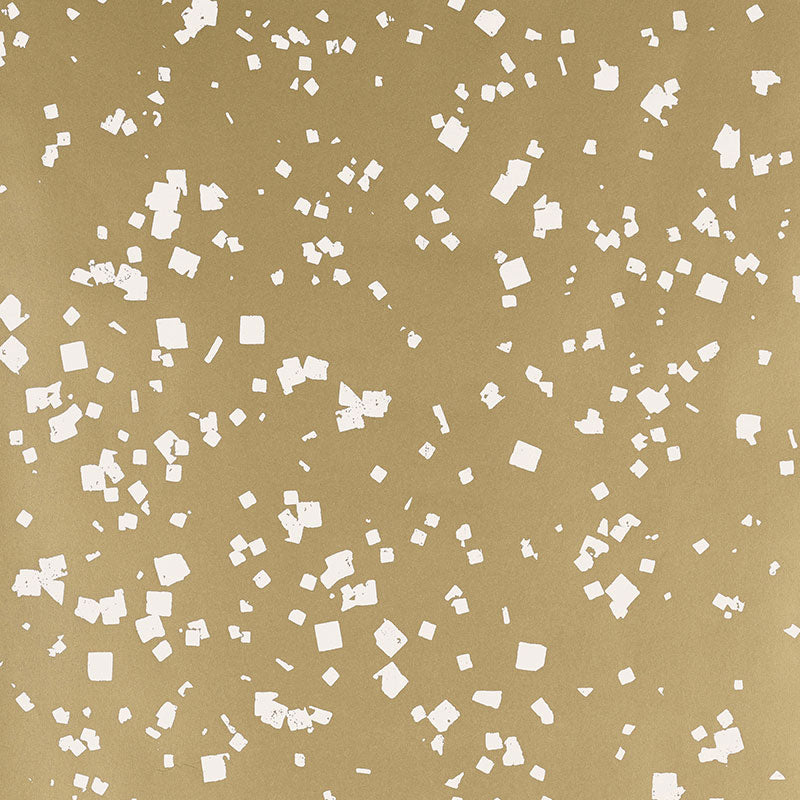 Snow Gilt wallpaper by Schumacher featuring a flurry of white dots and squares on a shimmering gold background.