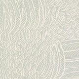Featherfest Smoke wallpaper by Schumacher featuring a graphic play of stylized feathers in a soft neutral colorway, shown in a modern interior setting.