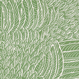 Featherfest Leaf wallpaper by Schumacher, a graphic play of stylized feathers in green and white, shown in interior settings.