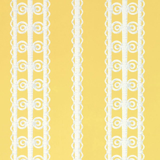 Wicker Stripe wallpaper in Lemon Blossom by Schumacher, featuring a yellow background with white wicker-inspired vertical stripes. Shown in a styled bedroom interior.