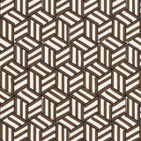 TUMBLING BLOCKS geometric chocolate brown and white wallpaper by Schumacher shown in a bathroom interior and close-up pattern view.