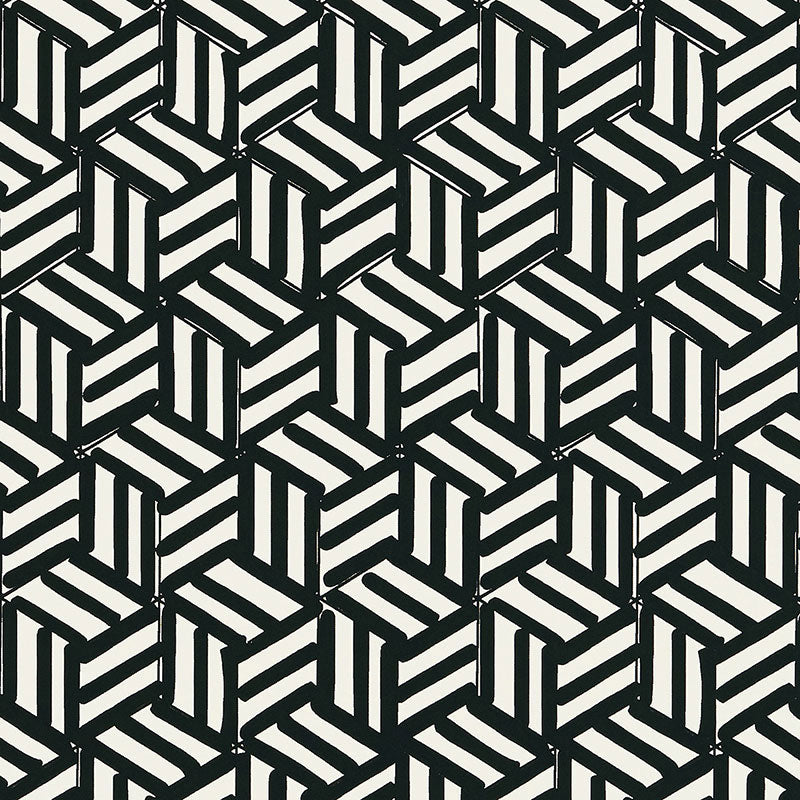 TUMBLING BLOCKS black and white geometric wallpaper by Schumacher, shown in a bathroom interior and as a pattern close-up.