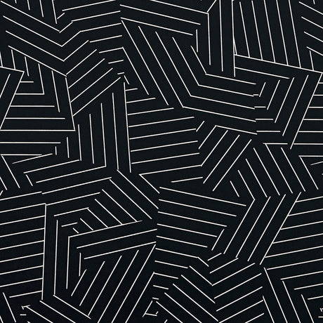 Deconstructed Stripe wallpaper in ivory on black by Schumacher, featuring a modern geometric stripe pattern.