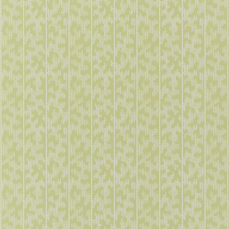 Montpellier Lime Blossom wallpaper by Schumacher in a bathroom setting, featuring a subtle geometric pattern in light green.