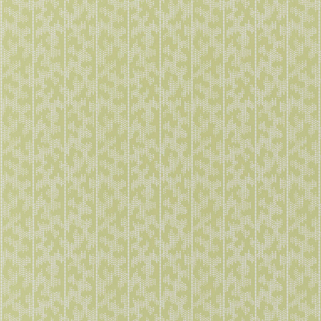 Montpellier Lime Blossom wallpaper by Schumacher in a bathroom setting, featuring a subtle geometric pattern in light green.