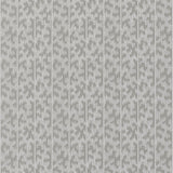 Montpellier Blanket by Schumacher - geometric dotted stripe wallpaper in a modern bathroom setting