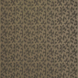 Montpellier Bronze Gilt wallpaper by Schumacher featuring a metallic geometric pattern in a bathroom setting.