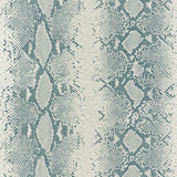 Snake Charmer Mineral animal print wallpaper by Schumacher, shown in a modern interior setting with a bold snakeskin pattern.