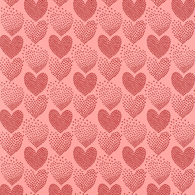 Heart of Hearts wallpaper in red and pink by Schumacher, featuring a whimsical heart pattern.