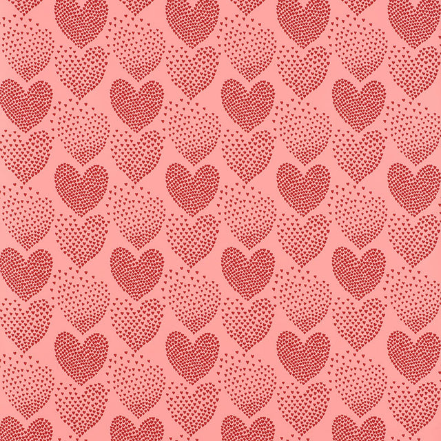 Heart of Hearts wallpaper in red and pink by Schumacher, featuring a whimsical heart pattern.