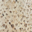 Platinum wallcovering in Smoky Gray by Schumacher, featuring a dense, hand-applied feather pattern for a luxurious, textural look.
