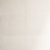 Glossed Vellum cream wallcovering by Schumacher shown in a modern dining room setting with a handcrafted parchment lookalike finish.