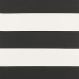 Baxter Stripe wallpaper in Carbon by Schumacher, bold horizontal black and white stripes, shown in a modern bathroom setting.