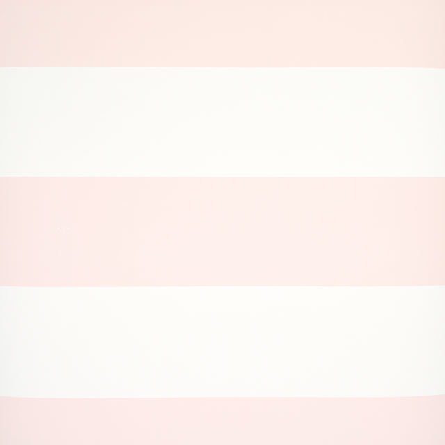 Baxter Stripe wallpaper in blush pink and white horizontal stripes by Schumacher, shown in styled and detail views.