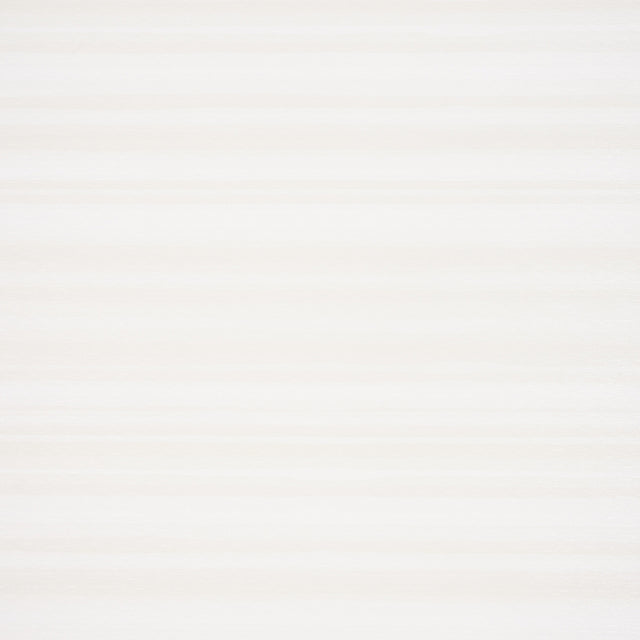 Shaded Silk Vinyl wallcovering in Alabaster by Schumacher, featuring a striated silk effect in durable vinyl.