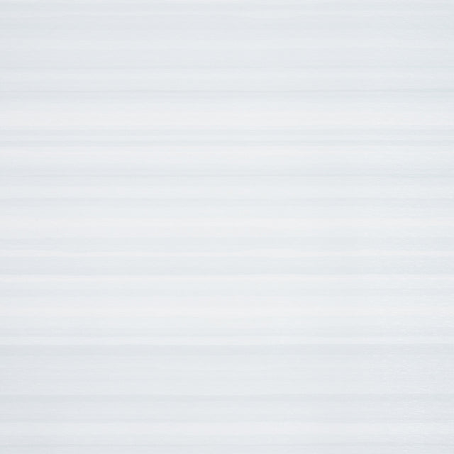 Shaded Silk Vinyl wallpaper in Sky colorway by Schumacher, featuring a striated silk effect in soft blue tones.