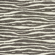 Ripple Vinyl wallpaper in black and ivory with zebra stripe pattern by Schumacher, designed by Celerie Kemble.