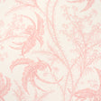 Ocean Toile wallpaper in coral by Schumacher, featuring an undersea toile pattern in pink on a white background, shown in a styled bathroom interior.