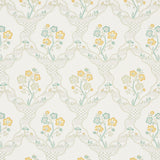 Marella wallpaper in Leaf by Schumacher, featuring a wavy trellis and botanical motifs in green and yellow on a light background.