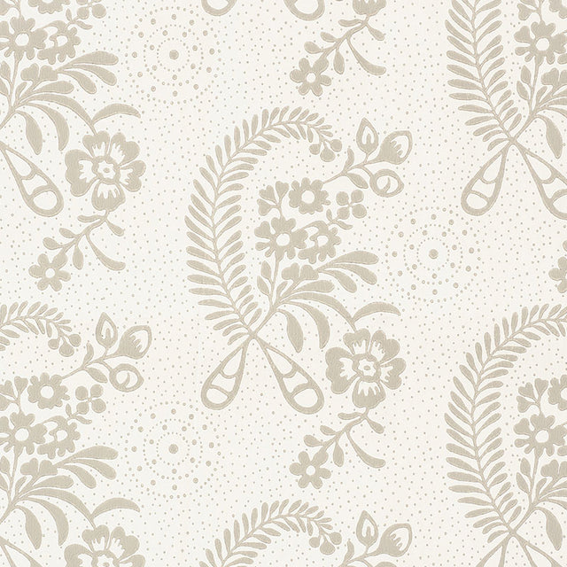 Millicent Grisaille wallpaper by Schumacher, a delicate floral surface-printed design with vintage appeal, shown in a styled bedroom interior.