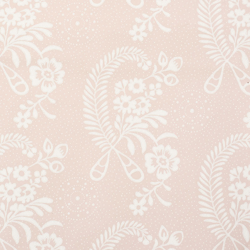 Millicent Rose wallpaper by Schumacher, delicate floral pattern in soft pink and white, surface printed, vintage appeal.