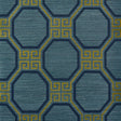 Octavia Sisal wallpaper in Peacock by Schumacher, featuring an octagonal geometric pattern with Greek key accents in blue and gold tones.