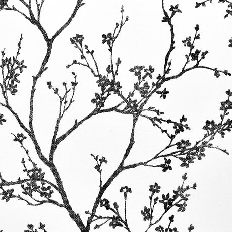 Twiggy Paperweave wallpaper in black by Schumacher, featuring a delicate botanical silhouette pattern on a textured paperweave ground.