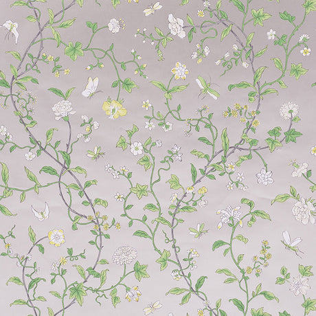 Floraison wallpaper in Citron Shimmer by Schumacher features a delicate, hand screen-printed floral motif with scrolling vines and blossoms.