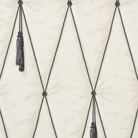 Bone colored trompe l'oeil wallpaper with diamond tufting and tassel design by Schumacher