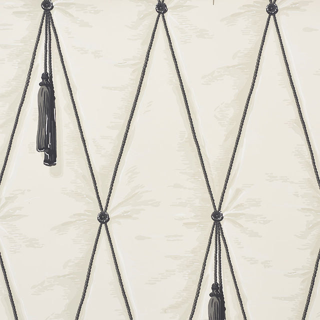 Bone colored trompe l'oeil wallpaper with diamond tufting and tassel design by Schumacher