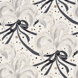 Plumes et Rubans wallpaper in champagne colorway featuring floating ostrich feathers, ribbons, and champagne bubbles by Schumacher.