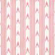 Santa Barbara Ikat pink wallpaper by Schumacher in a bathroom setting, featuring a vertical ikat stripe pattern.