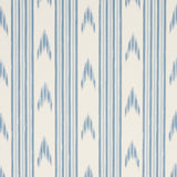 Santa Barbara Ikat wallpaper in China Blue by Schumacher, featuring a blue and white ikat stripe pattern, styled in a kitchen interior.