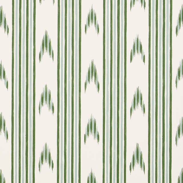Santa Barbara Ikat wallpaper in Leaf Green by Schumacher, featuring a hand-painted ikat stripe pattern in green on a white background.